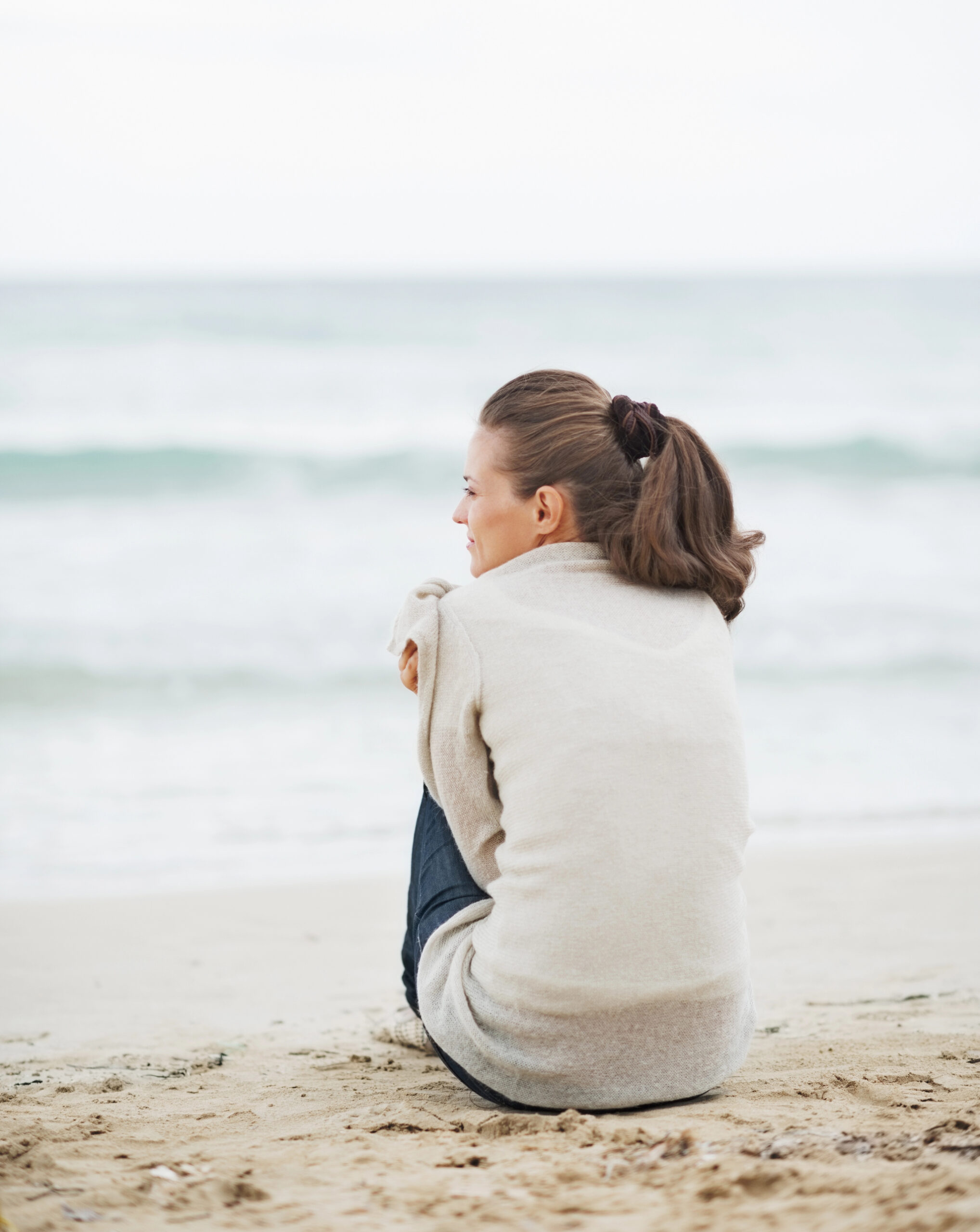 Person enjoying a peaceful moment, representing comfortable online therapy from anywhere