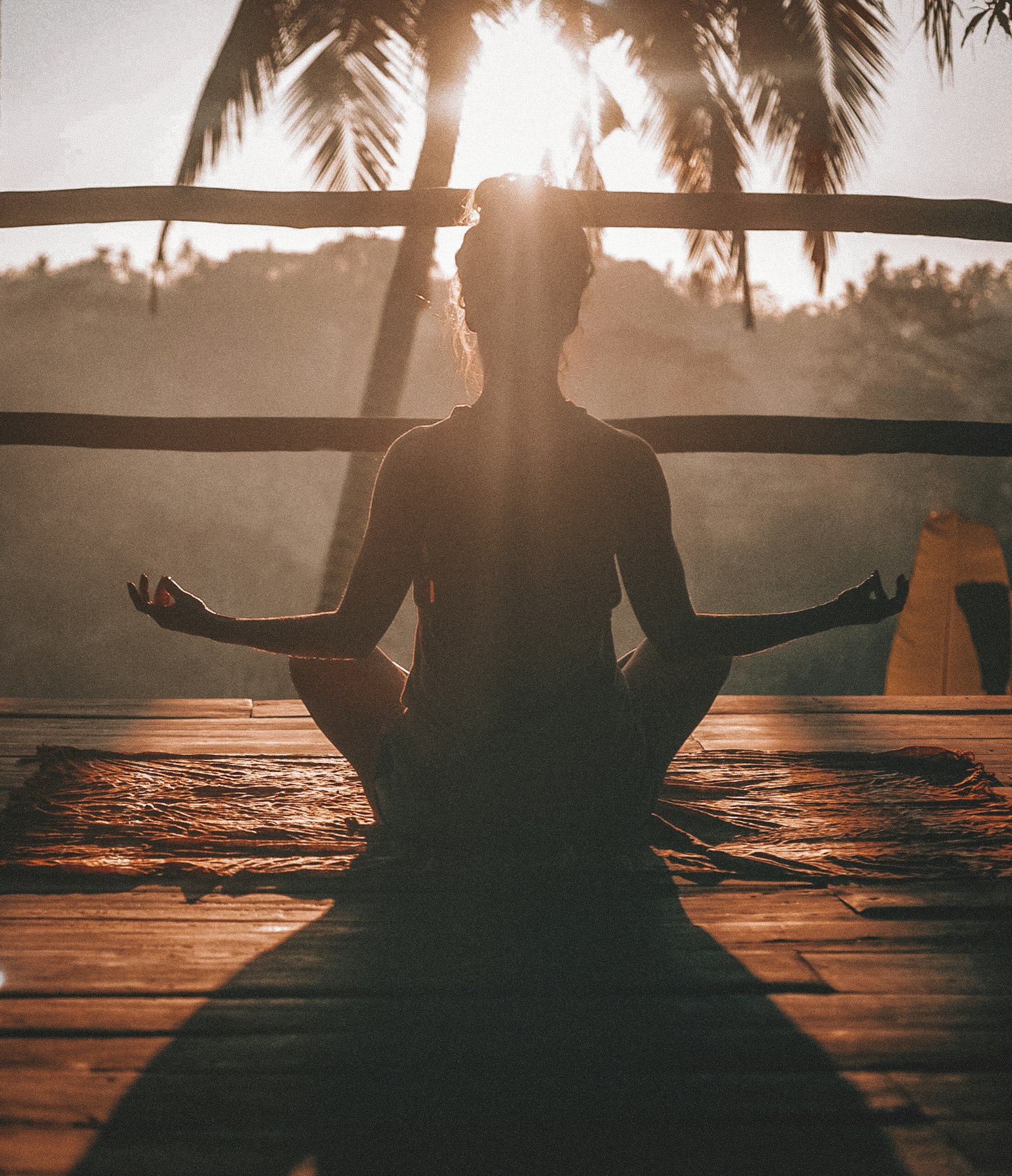 A calm person practicing mindfulness meditation outdoors